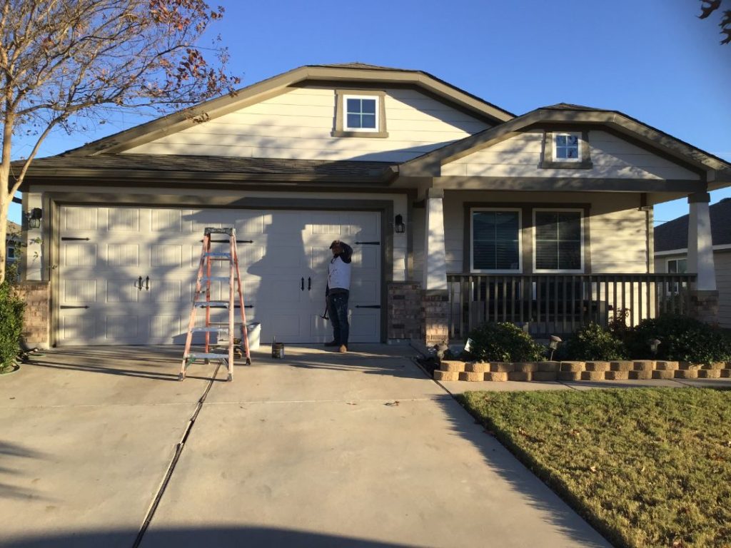 Exterior Painting in Progress Garage Door Focus