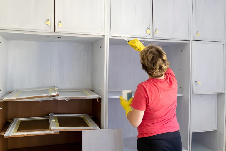 Woman upcycling old furniture during stay at home